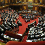 Italy's Prime Minister Matteo Renzi talks during a confidence vote at the Senate in Rome February 24, 2014. Renzi faces his first test before a fractious national parliament on Monday when he goes to the Senate to put flesh on ambitious reform plans and seeks to win a confidence vote in his newly installed government. REUTERS/Tony Gentile  (ITALY - Tags: POLITICS)