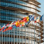 depositphotos_43781563-stock-photo-european-parliament-frontal-flags