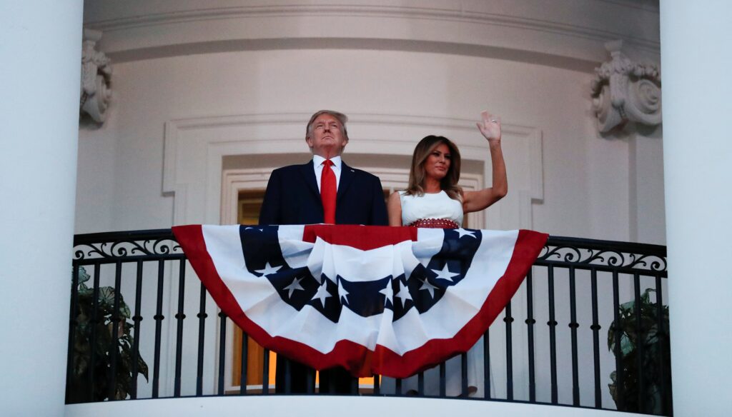 U.S. President Donald Trump and first lady Melania Trump watch the Washington, D.C. fireworks display from the Truman Balcony as they celebrate the U.S. Independence Day holiday at the White House in Washington, U.S., July 4, 2020.   REUTERS/Carlos Barria