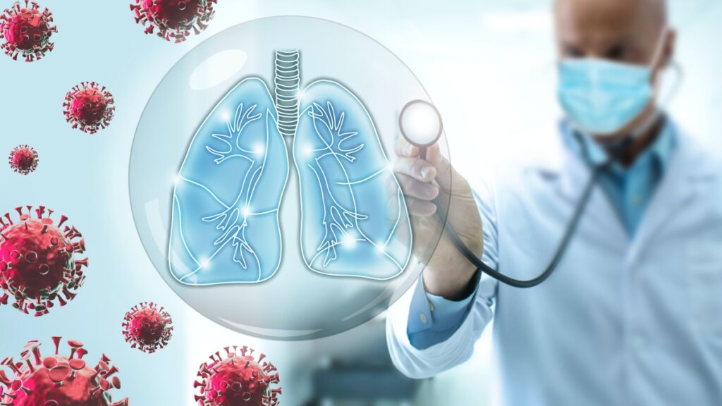 Doctor pulmonologist take care of the human lungs against the backdrop of flying COVID-19 viruses. Pneumonia caused by a complication from coronavirus. Diagnosis of the treatment of pneumonia.