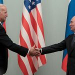 FILE PHOTO: Russian Prime Minister Vladimir Putin shakes hands with U.S. Vice President Joe Biden during their meeting in Moscow March 10, 2011. REUTERS/Alexander Natruskin/File Photo